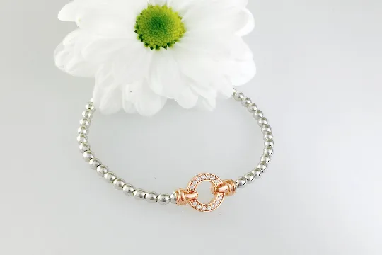 Exquisite Silver Designer Circle Bracelet.  Rose gold pave set circle.